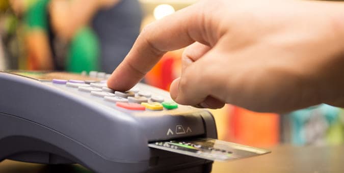 Customer using an EMV chip card during checkout