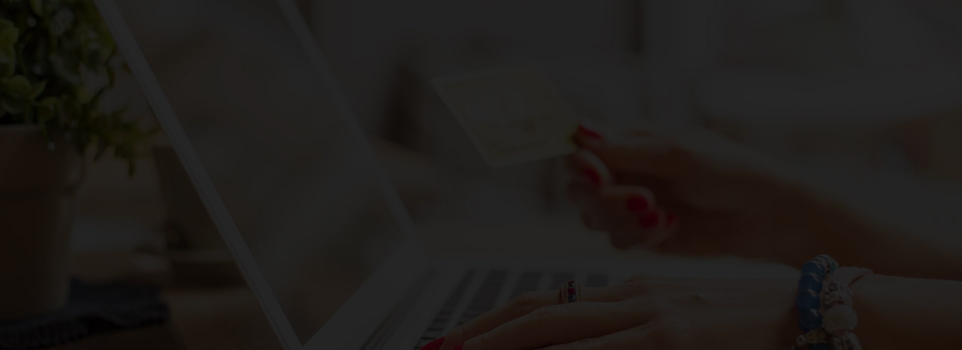woman making a purchase online with credit card 