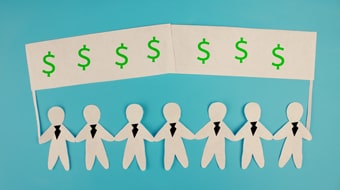 paper cutout over blue background
