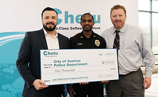 Left to Right: Brian Poole, Director of Marketing at Chetu, Sgt. Alexander St. Preux, and Deputy Mayor Neil Kerch, at Chetu’s check presentation ceremony on National Law Enforcement Appreciation Day.