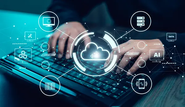 Custom Healthcare Software Development Services Hand on keyboard with patient icons and health data above, symbolizing Custom Databricks Consulting Services.